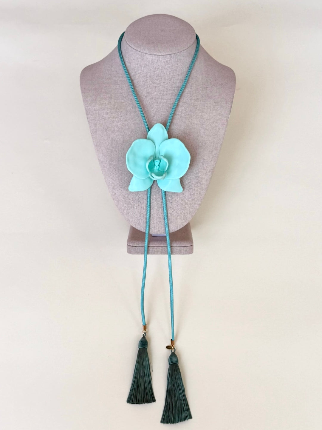 ORCHID TURQOUISE BOLO W/BLUE CORD