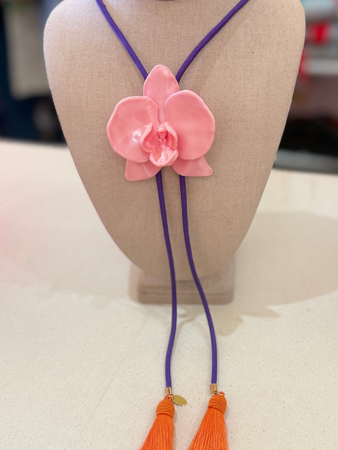 ORCHID PINK BOLO W/PURPLE CORD